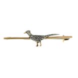 A diamond pheasant bar brooch.Bar brooch with hallmarks for 9ct gold.