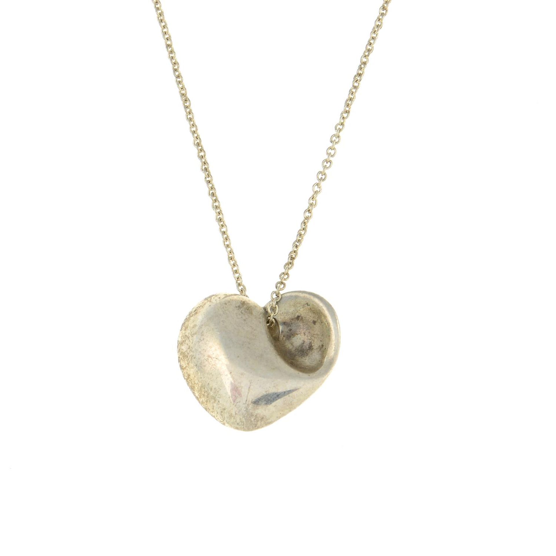 A full heart pendant with chain, by Tiffany & Co.Signed Tiffany & Co.