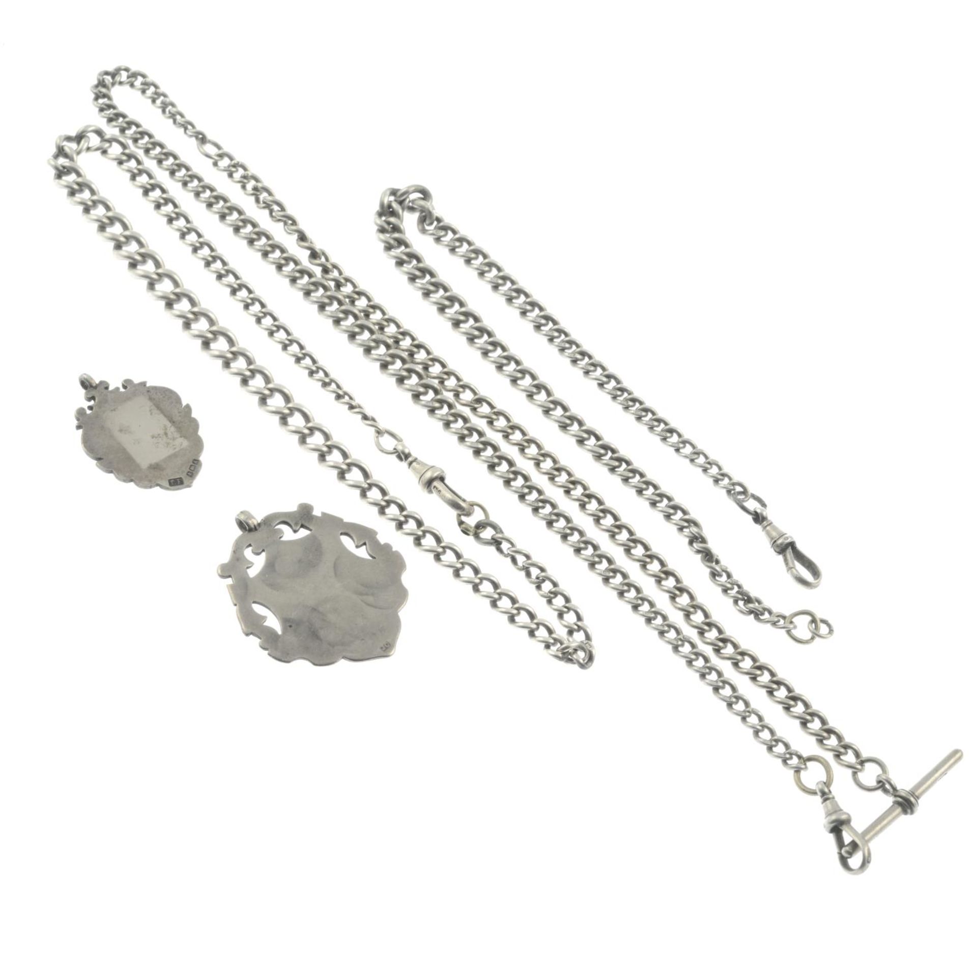 Three silver albert chains with a silver medallion and a further medallion. - Image 2 of 2