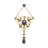 An Edwardian amethyst and split pearl pendant.