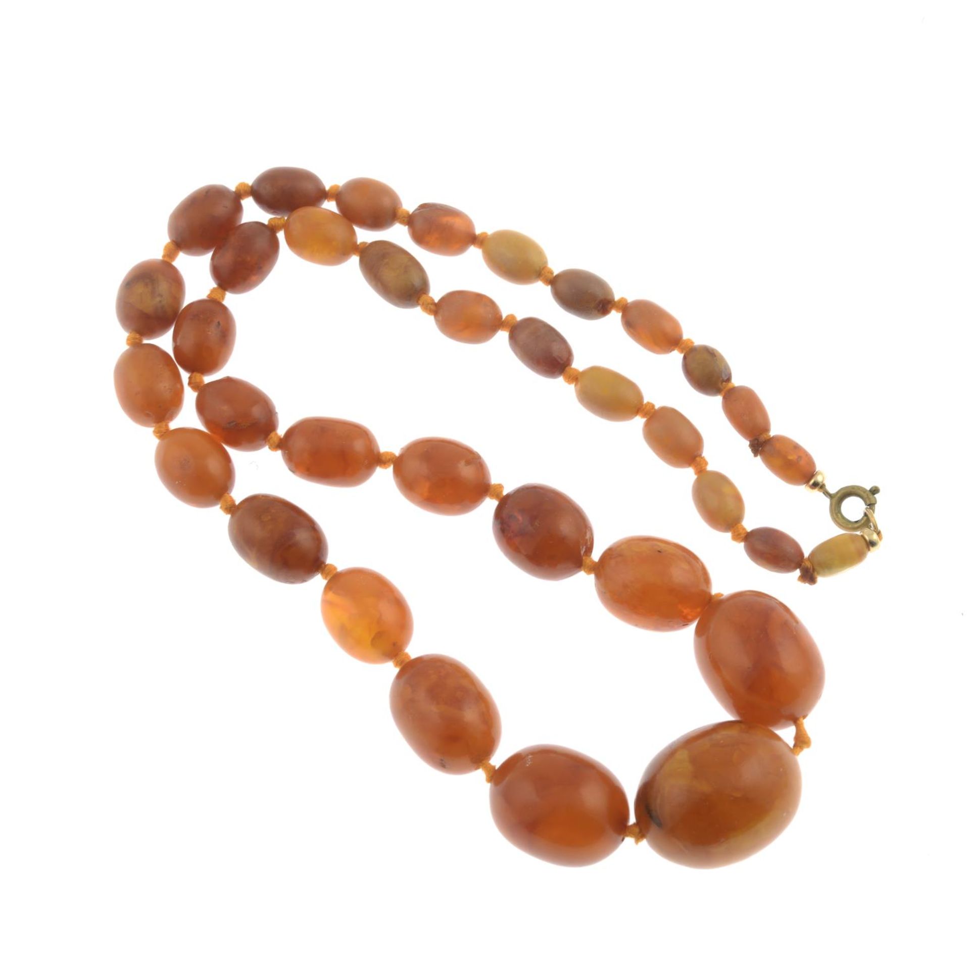 A graduated amber bead necklace.Amber is untested.Diameter of beads 0.9 to 2.6cms. - Image 2 of 2