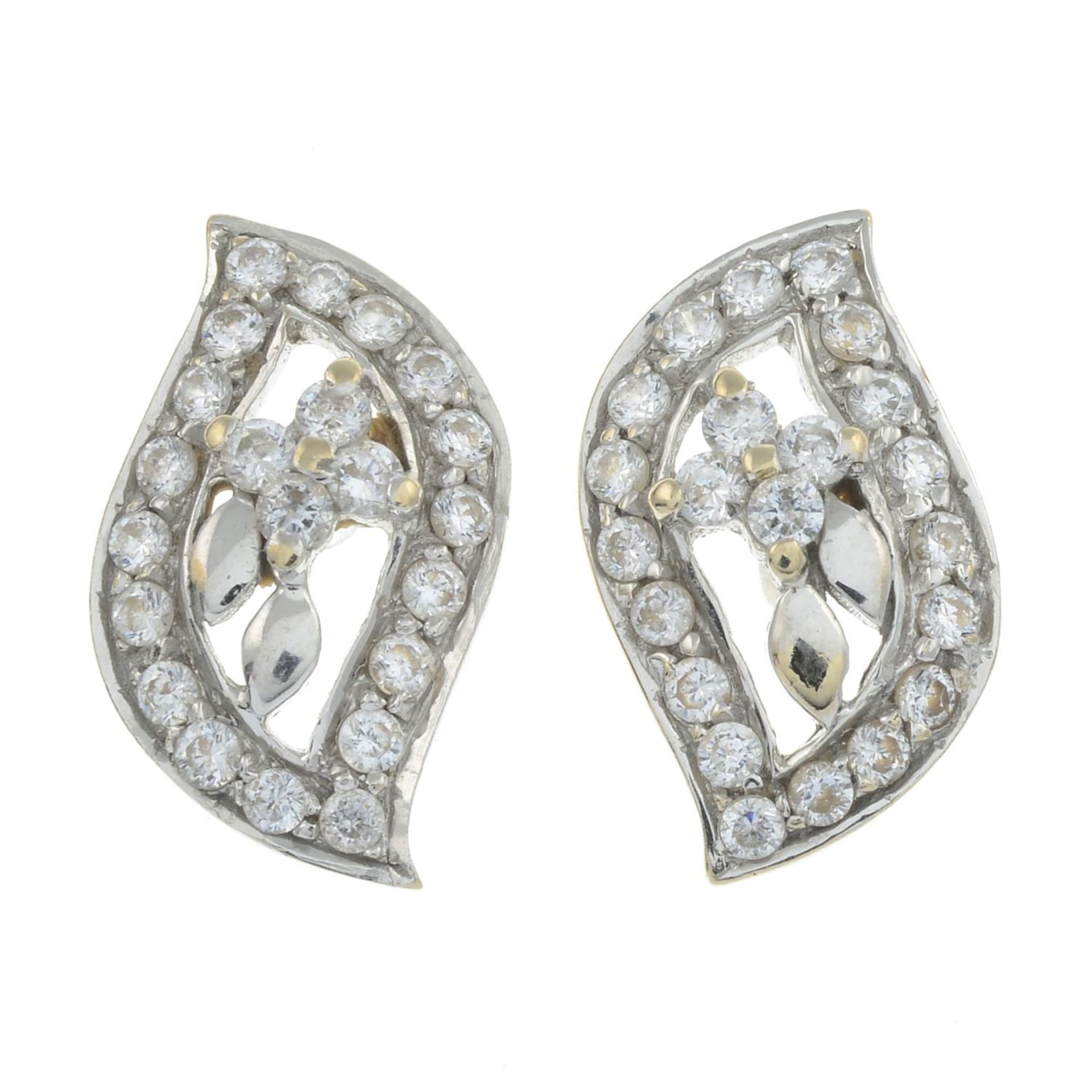 A pair of cubic zirconia floral earrings.