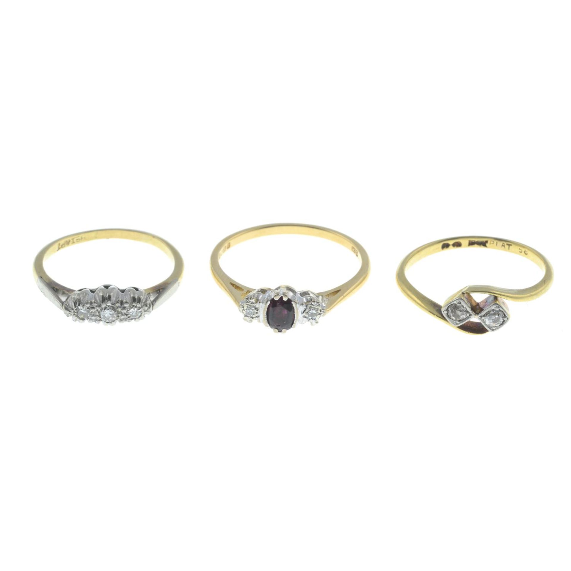 Three 18ct gold gem-set rings.Mid 20th century old-cut diamond two-stone ring,