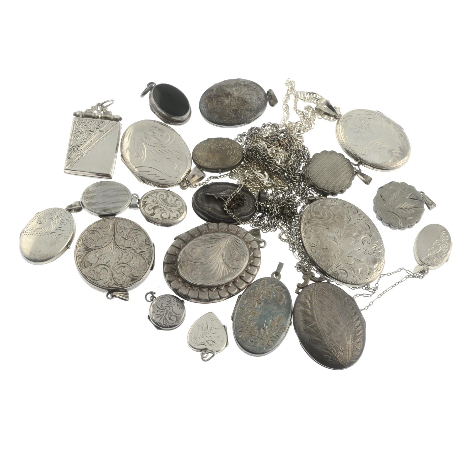 A selection of silver lockets, to include an engraved locket and chain. - Image 2 of 2