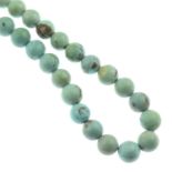 A turquoise matrix bead necklace.Clasp stamped 925.Diameter of beads 1.5cms.