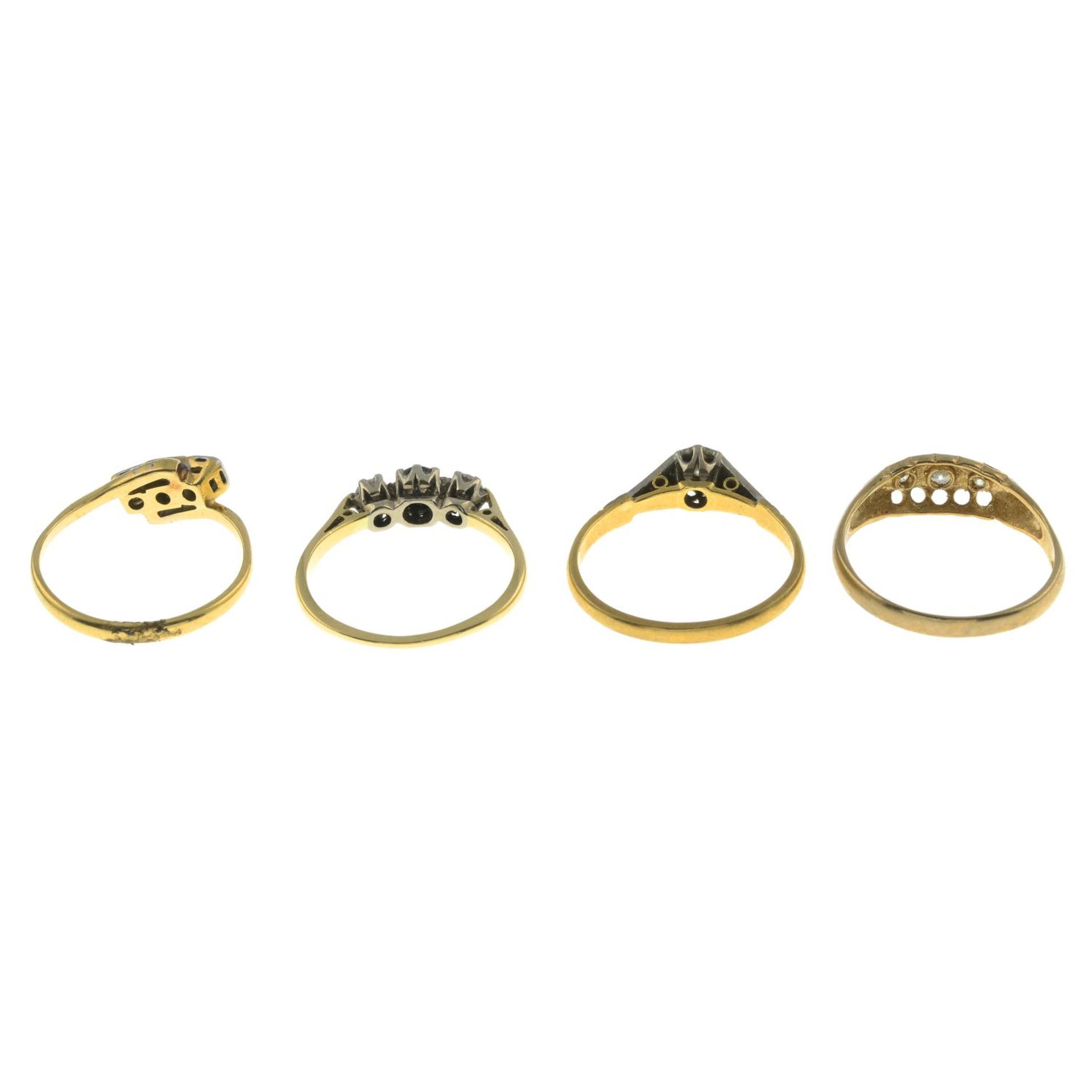 Four gem-set rings.18ct gold cubic zirconia and black gem three-stone ring, - Image 2 of 2