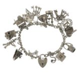 Two silver charm bracelets, a further charm bracelet and assorted charms.