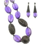 An amethyst necklace earring set,