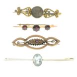 Four late Victorian to early 20th century gold gem-set bar brooches.Late Victorian 15ct gold split