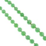 Two graduated jade necklaces.Jade is untested.