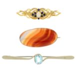 An aquamarine bar brooch, a 9ct gold sapphire and opal brooch and an agate brooch.