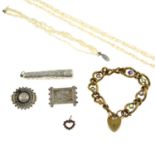 A large selection of sliver and costume jewellery, to include an Edwardian engraved brooch.