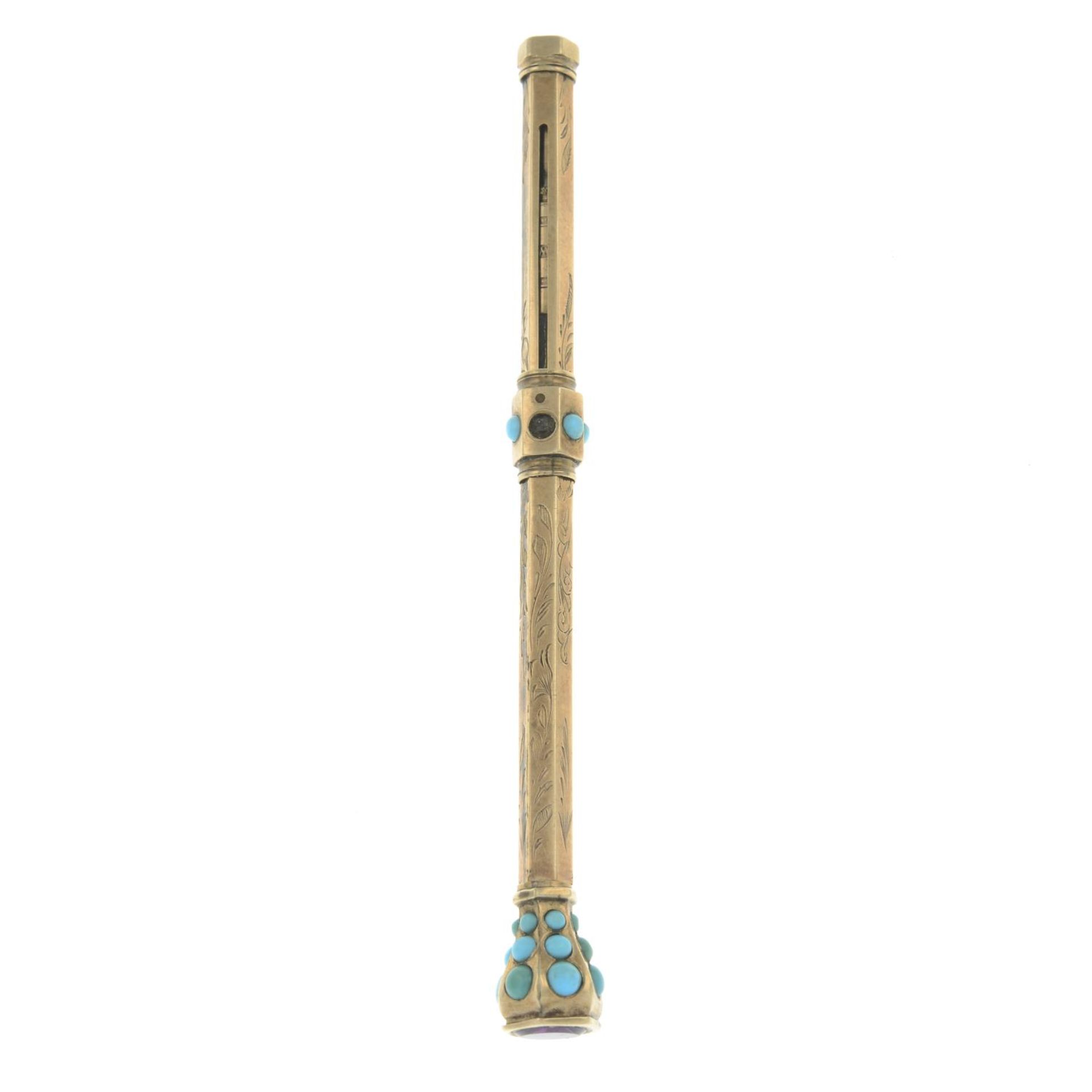 A late 19th century pencil, with turquoise accent and amethyst terminal.Full length 10.1cms.