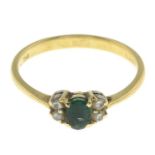 An emerald and diamond dress ring.Estimated total diamond weight 0.10ct.Stamped 750.Ring size Q.