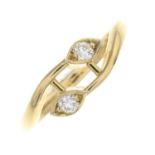 A 9ct gold diamond crossover ring.