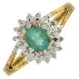A 9ct gold emerald and diamond cluster ring.Hallmarks for Birmingham.Ring size O.