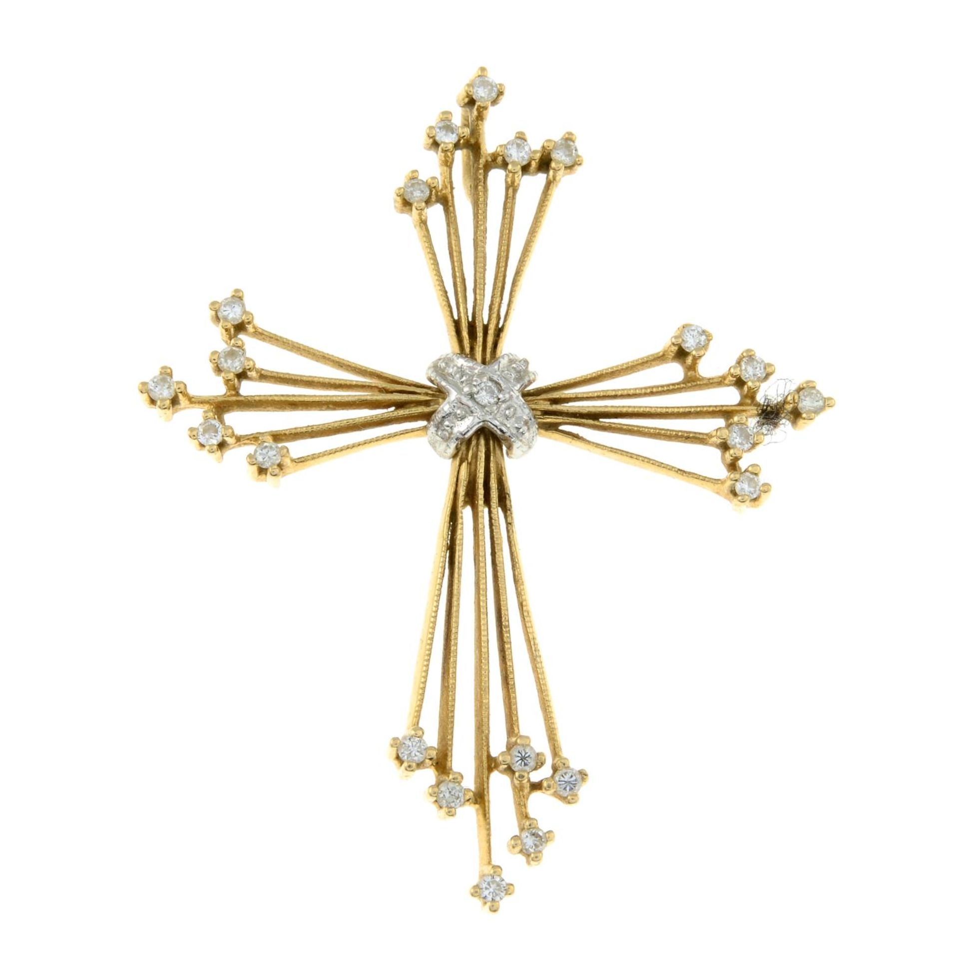 A diamond cross pendant.