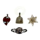 A selection of jewellery, to include a silver engraved heart shaped pill box.
