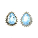 A pair of 9ct gold blue topaz and diamond earrings.Hallmarks for Birmingham.Length 1.7cms.