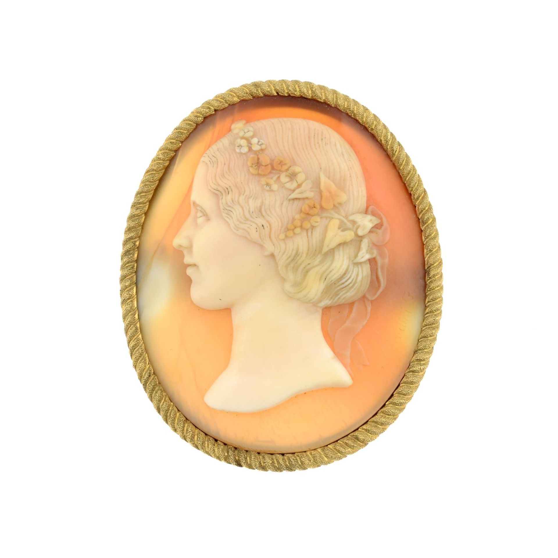 A mounted cameo brooch.Length 5.5cms.19.6gms.