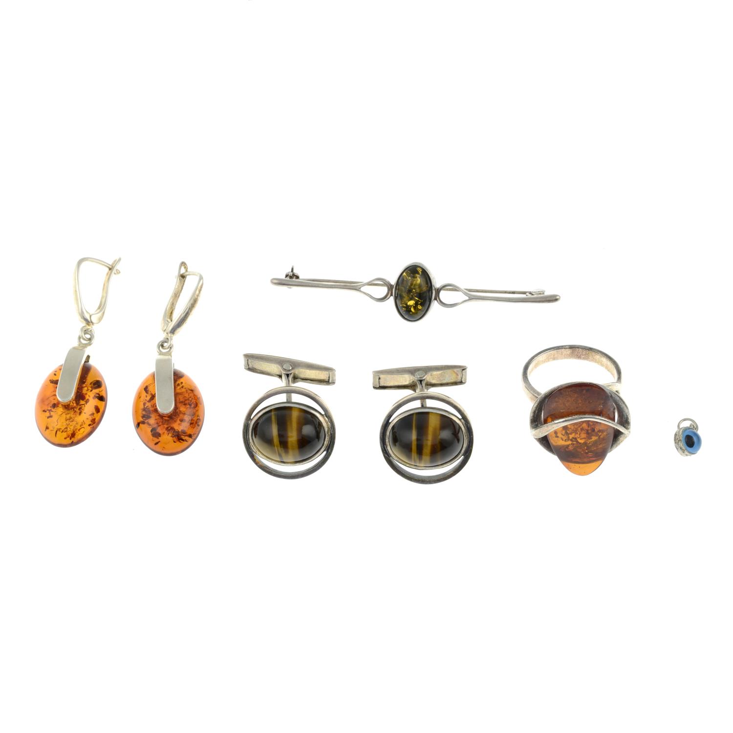 A selection of amber jewellery and a pair of tigers eye cufflinks.Many with marks to indicate - Image 3 of 3