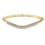 A 9ct gold diamond hinged bangle.