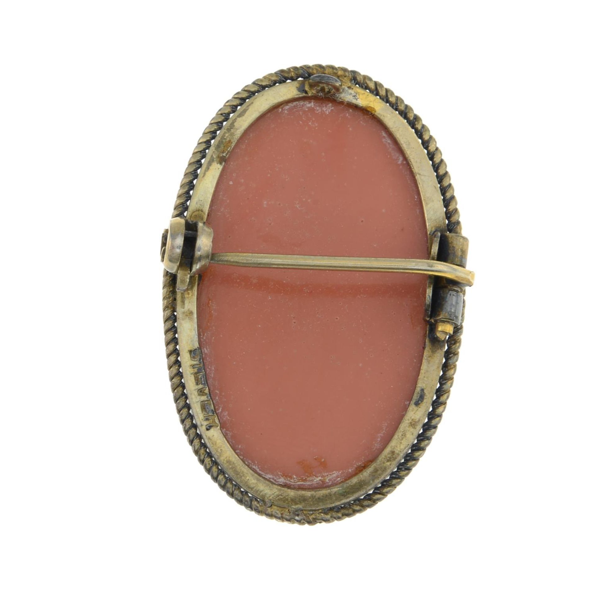 A coral cameo brooch.Coral is untested.Stamped silver.Length 3cms. - Image 2 of 2