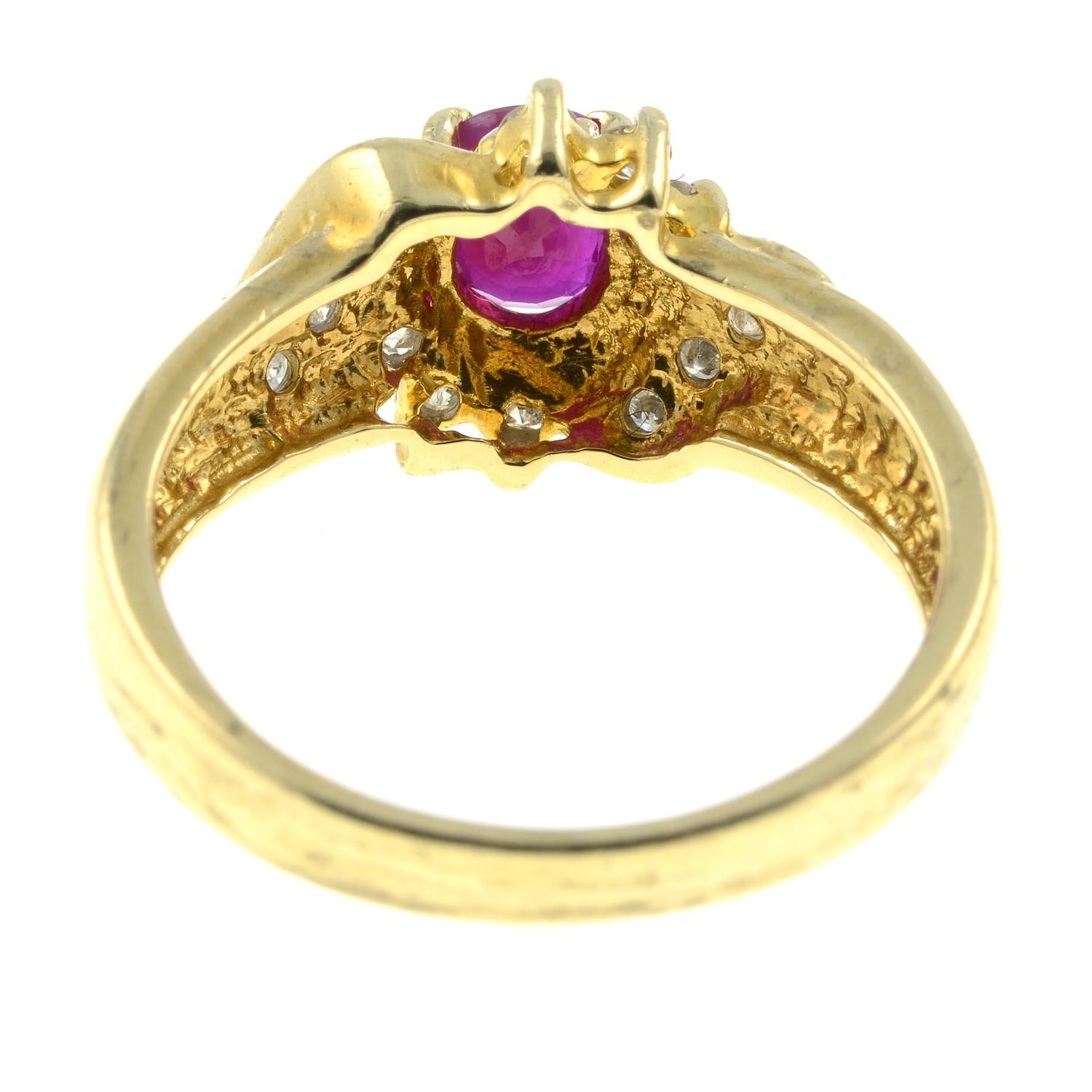 A diamond and ruby cluster ring.Estimated total diamond weight 0.20ct. - Image 2 of 2
