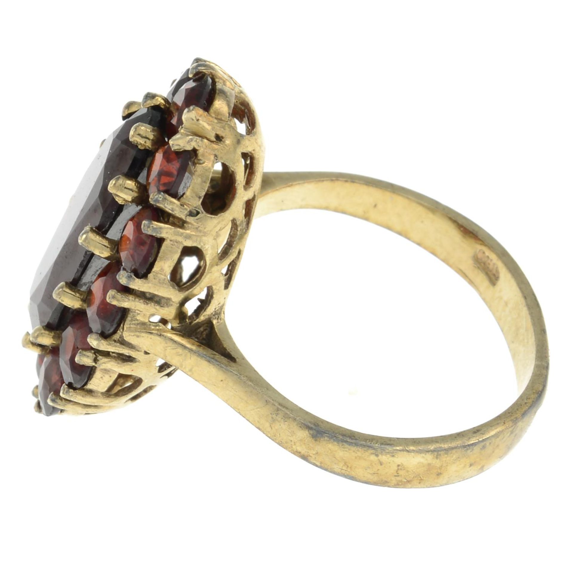 A garnet cluster ring.Stamped 333.Ring size J. - Image 2 of 3