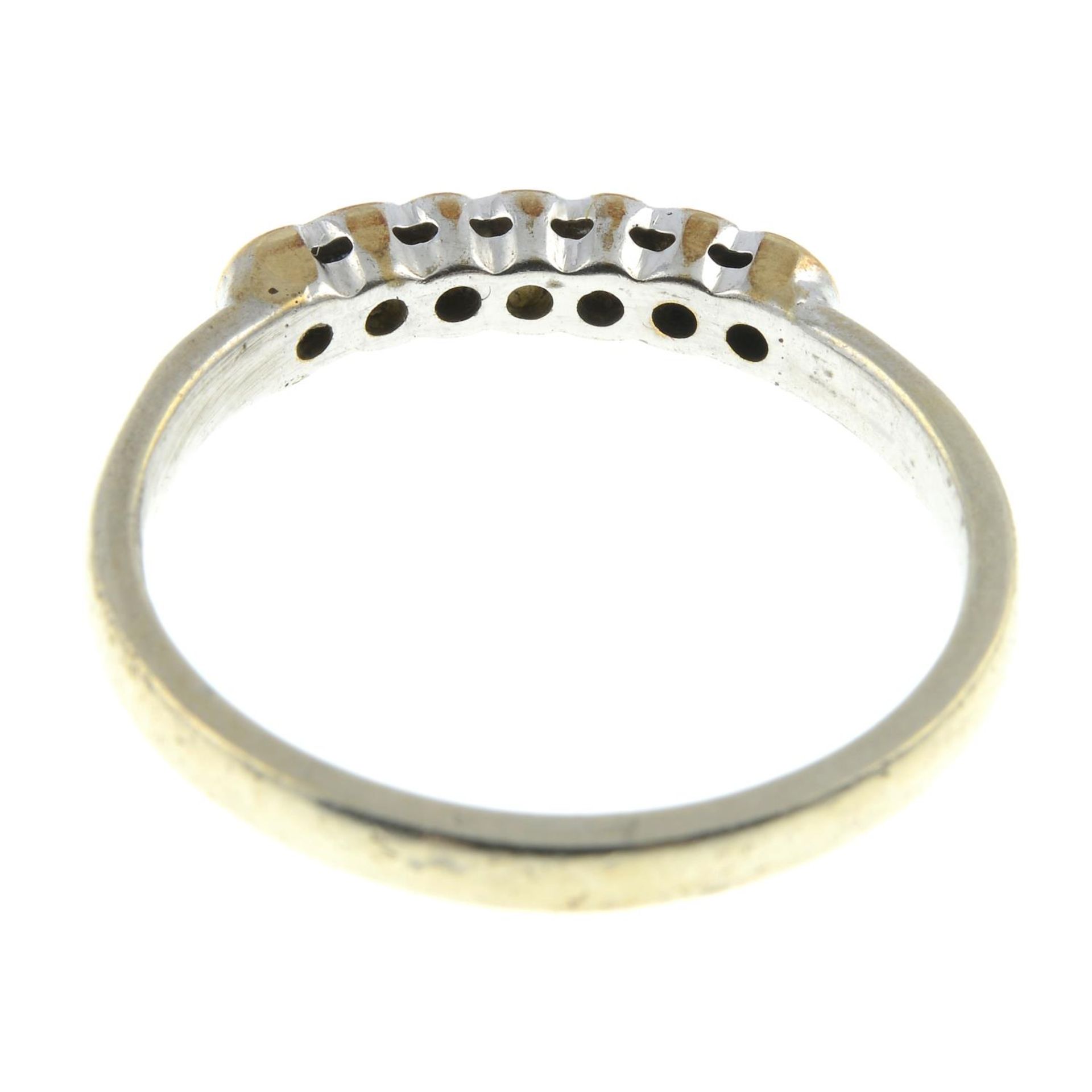 A 9ct gold diamond and sapphire half eternity ring.Estimated total diamond weight 0.15ct. - Image 2 of 2