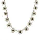 A selection of jewellery, to include a filigree daisy necklace.