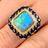 An opal, sapphire and diamond dress ring, by Fei Liu.Opal weight 2.80cts.