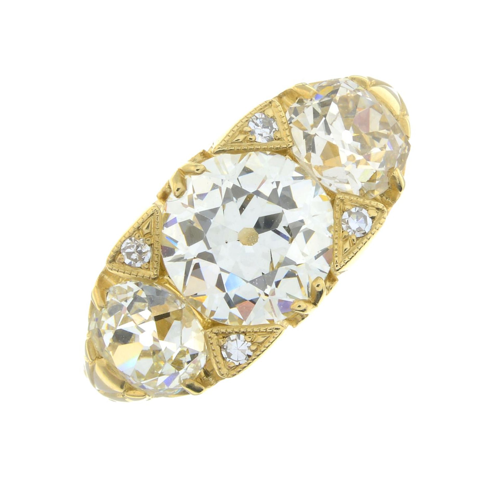 A graduated old-cut diamond three-stone ring, with single-cut diamond accents. - Image 3 of 7