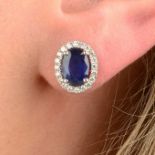 A pair of 18ct gold sapphire and diamond earrings.Sapphire calculated total weight 2.79cts,