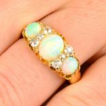 A late Victorian 18ct gold opal three-stone ring, with old-cut diamond spacers.