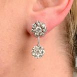 A pair of brilliant-cut diamond cluster earrings, with detachable diamond cluster drops.