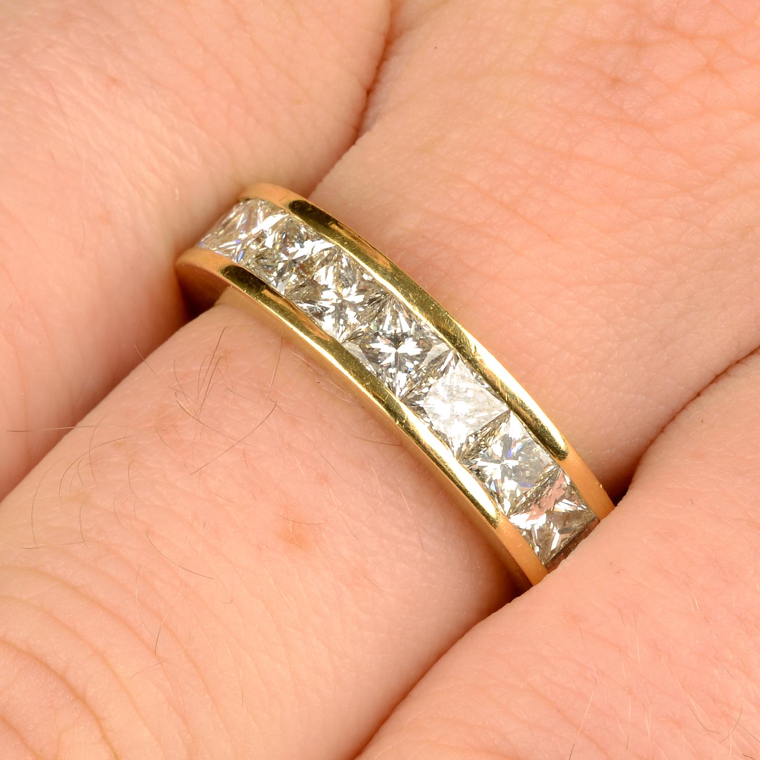 An 18ct gold square-shape diamond full eternity ring.