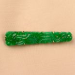 A carved 'A-type' jade brooch.