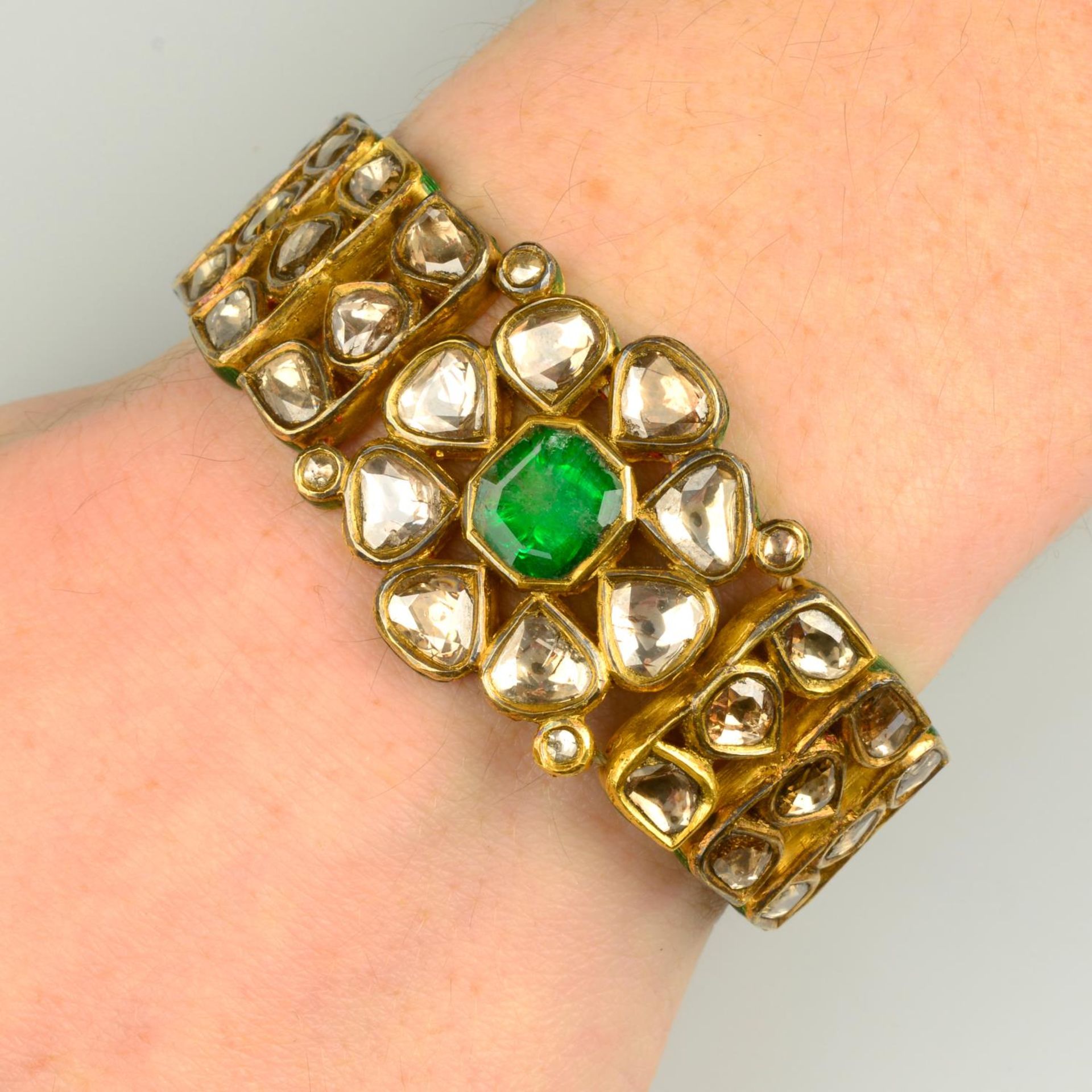 A Kundan emerald and polki diamond enamel bracelet.Length 16.8cms.