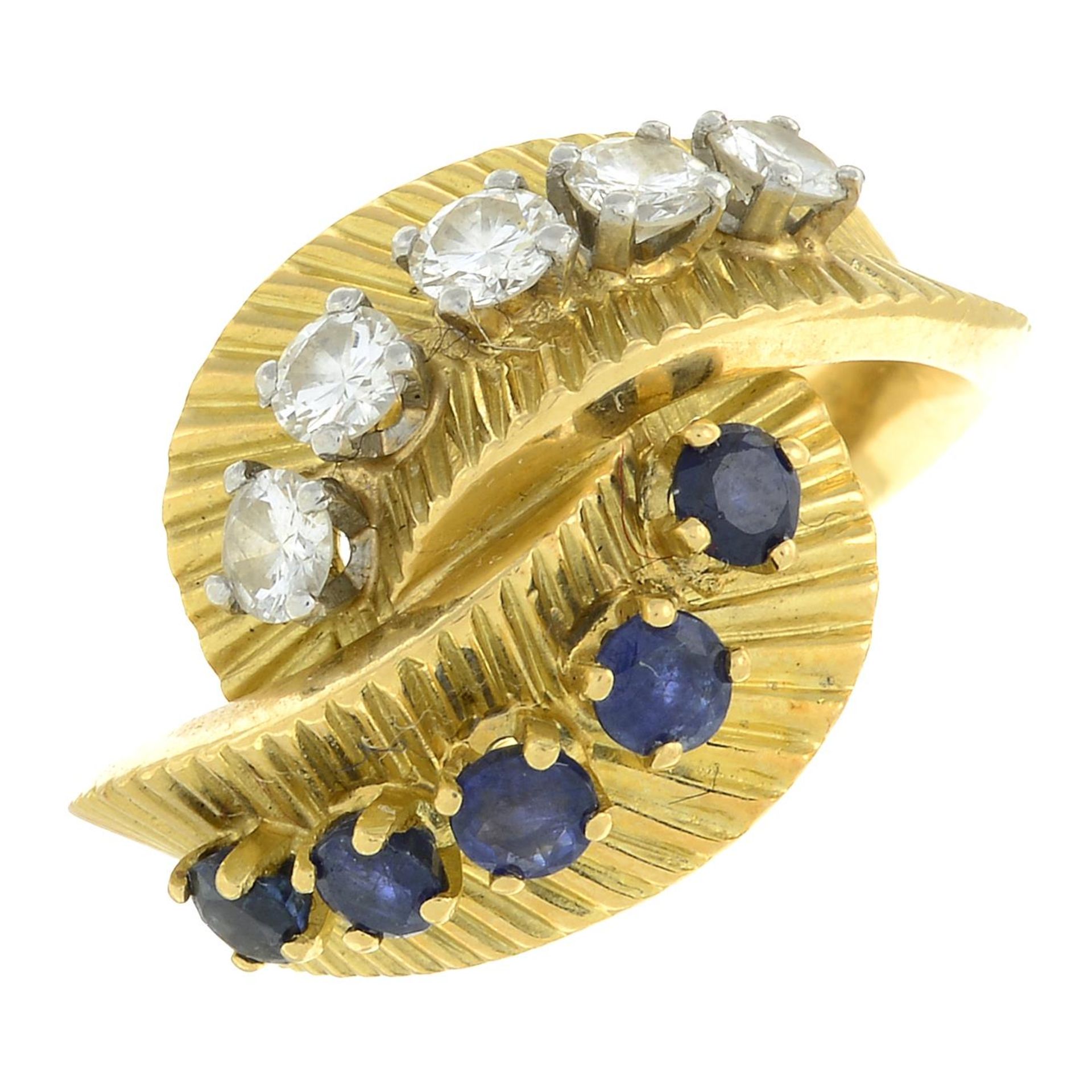 A 1960s sapphire and diamond crossover dress ring.Estimated total diamond weight 0.60ct, - Bild 2 aus 8