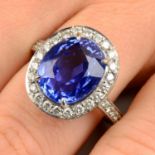 A Sri Lankan sapphire and brilliant-cut diamond cluster ring.With report 79211-05,