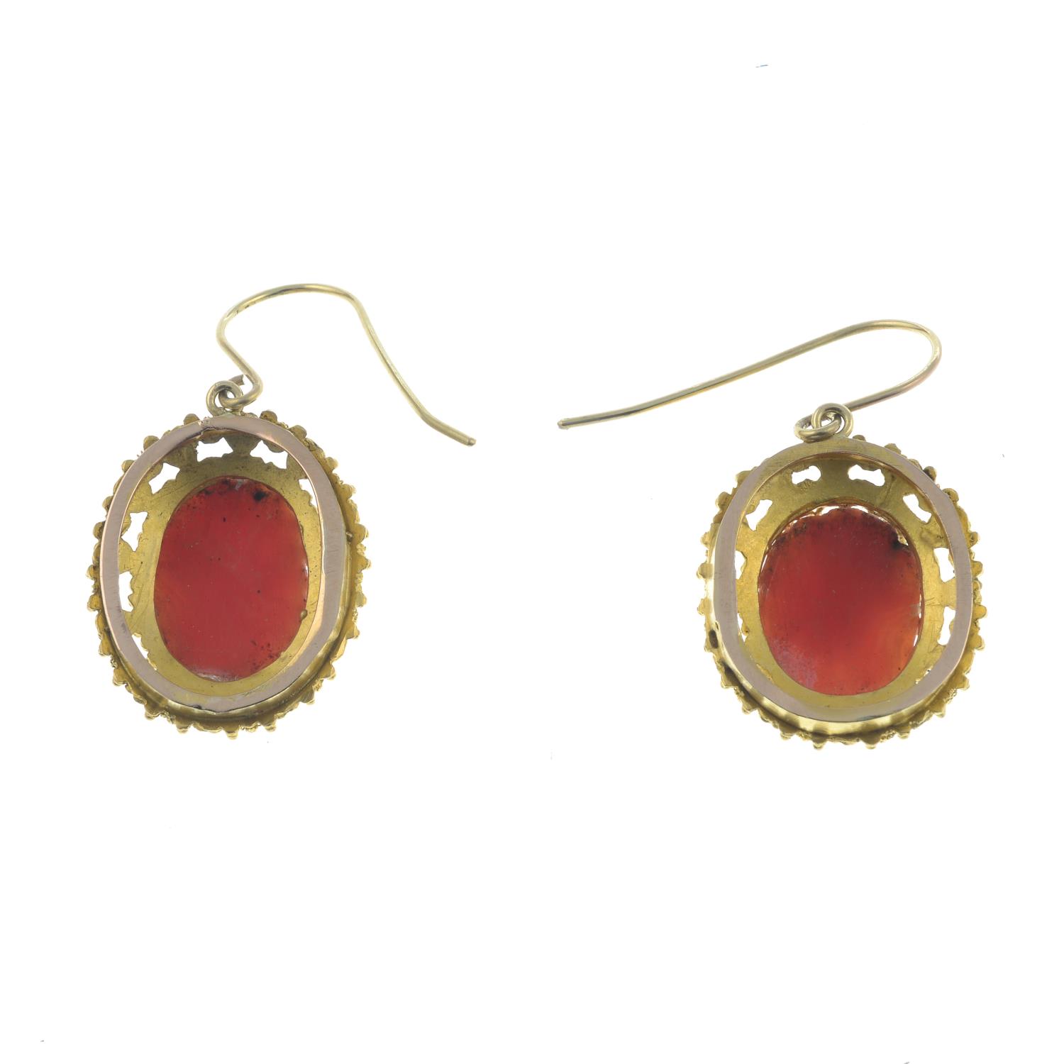 A pair of mid to late 19th century gold coral cameo earrings.Length 3.4cms. - Image 3 of 3