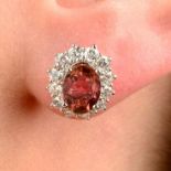 A pair of 18ct gold pink tourmaline and brilliant-cut diamond cluster earrings.Total tourmaline