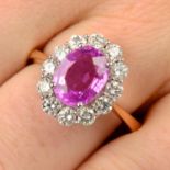 An 18ct gold pink sapphire and diamond cluster ring.