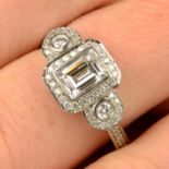 A platinum rectangular-shape and brilliant-cut diamond dress ring.