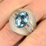 An aquamarine, diamond and frosted rock crystal ring.Estimated dimensions of aquamarine 13.7 by