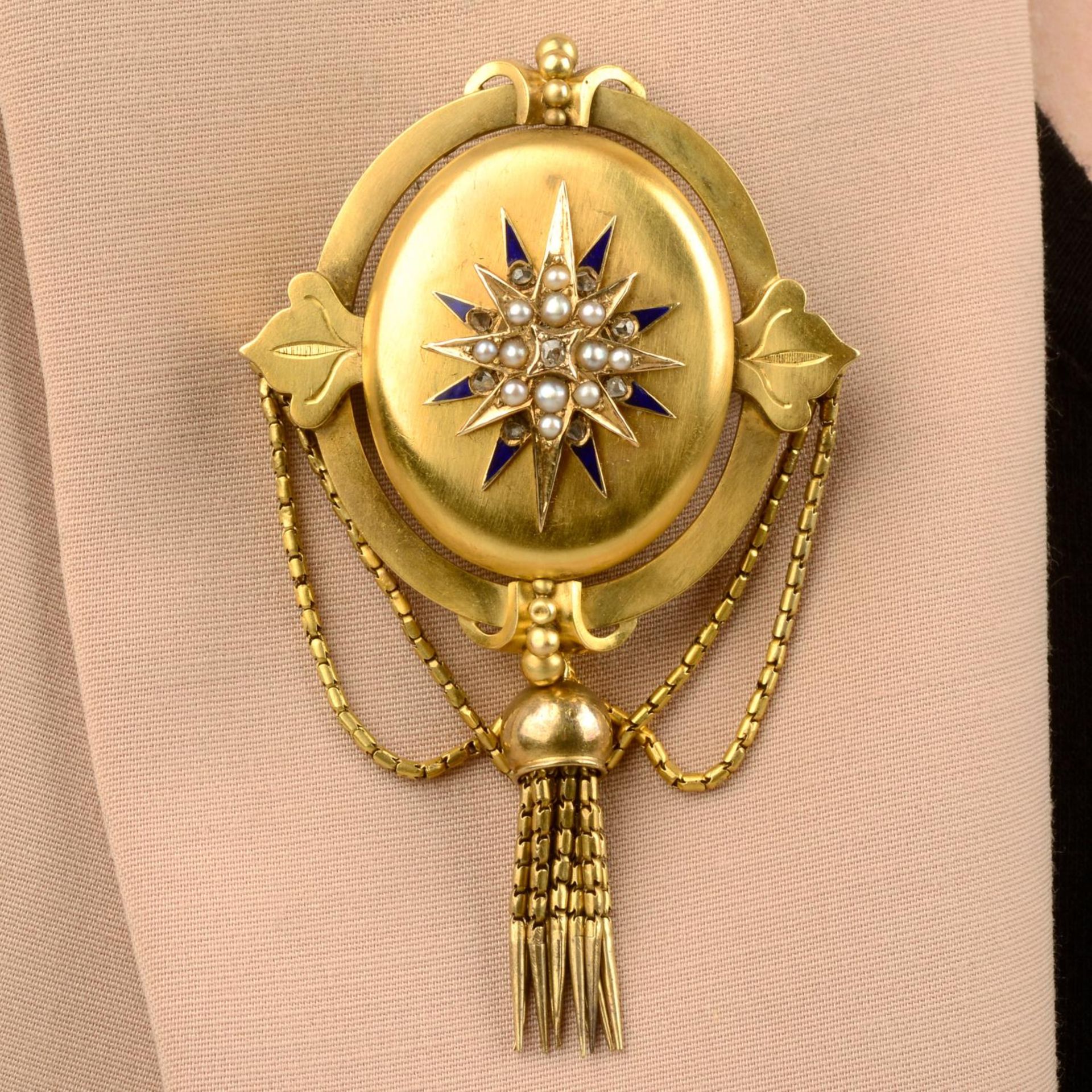 A late Victorian 18ct gold diamond, split pearl and blue enamel star motif brooch.Stamped 18ct.