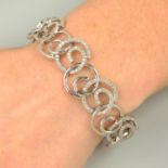 A diamond spiral-link bracelet.