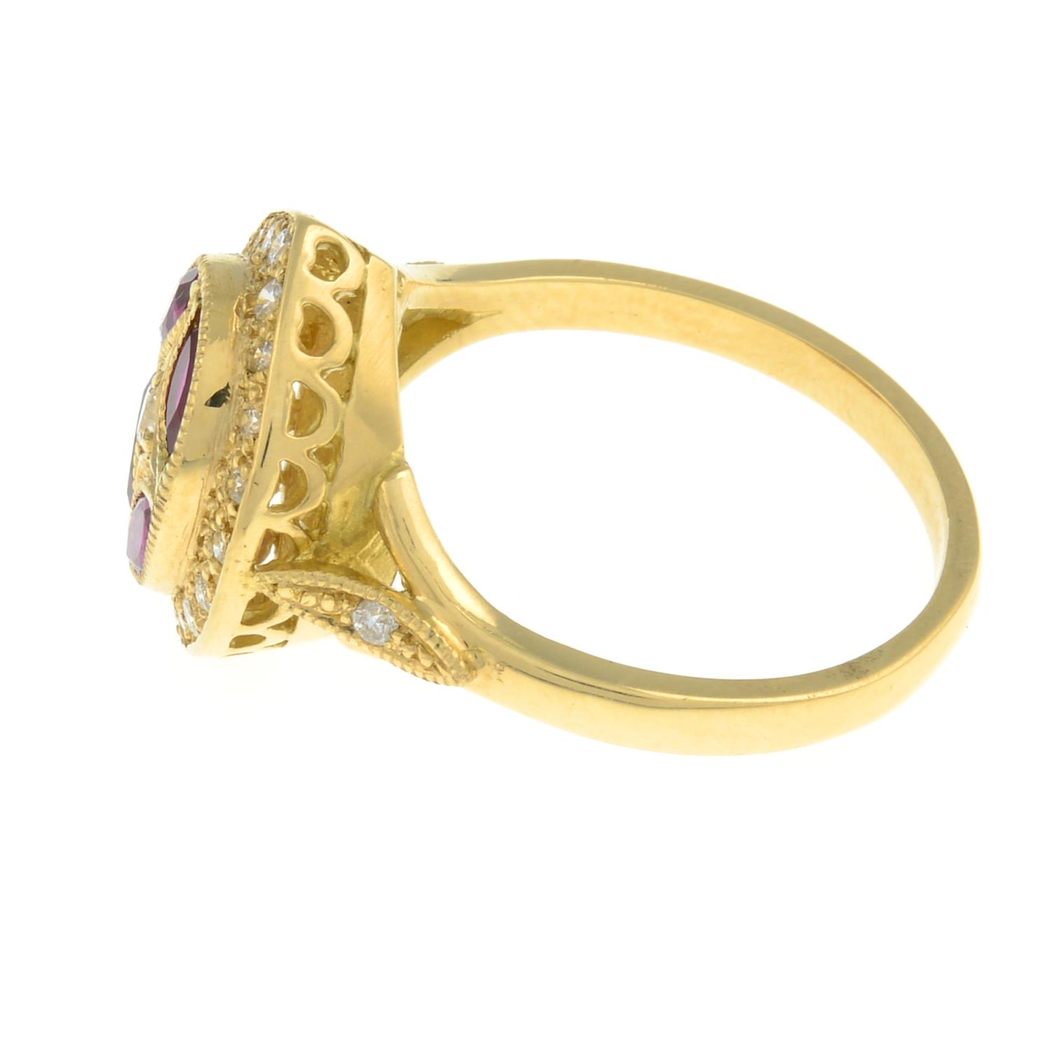 An 18ct gold ruby and diamond dress ring. - Image 6 of 8