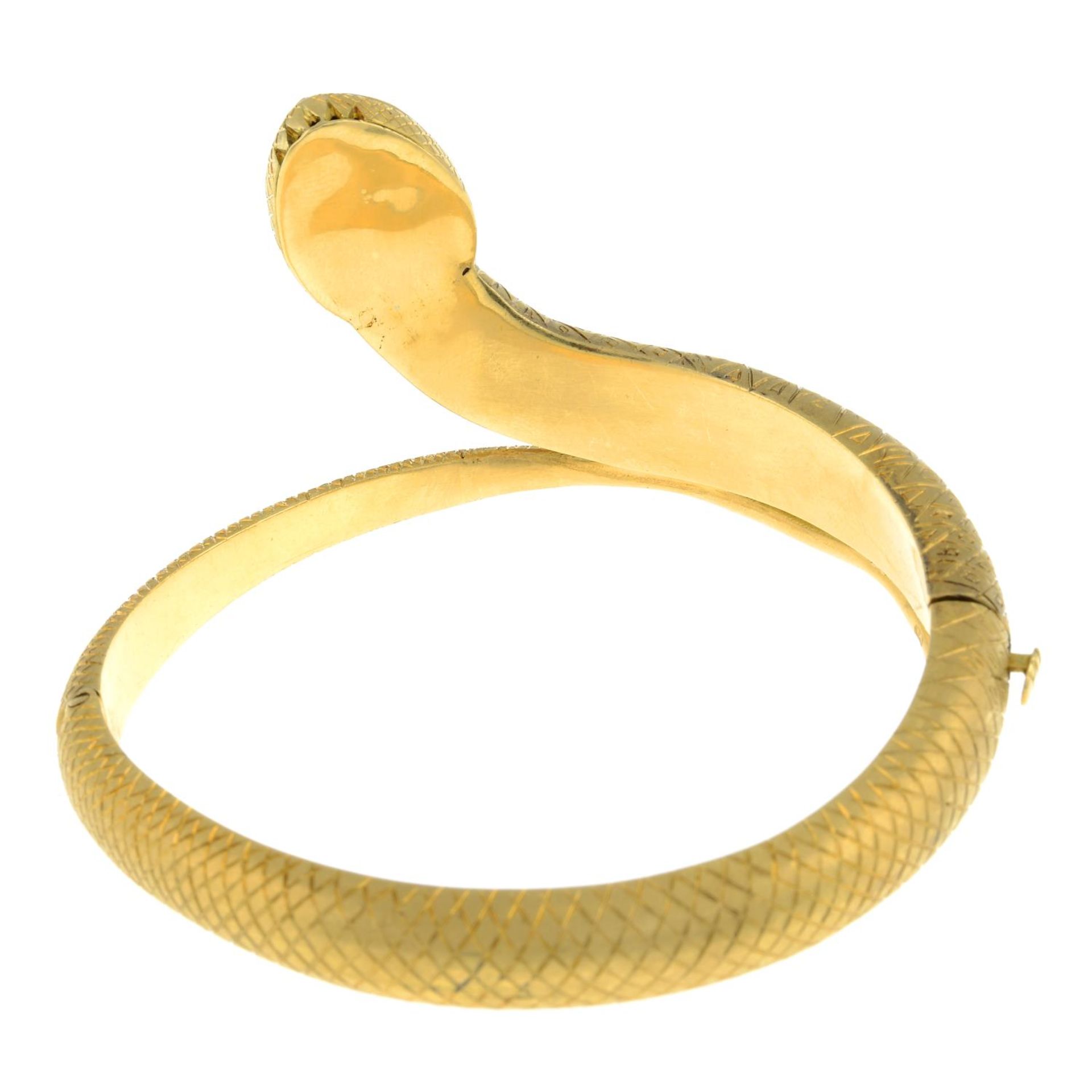 An engraved and textured snake bangle, - Image 5 of 6